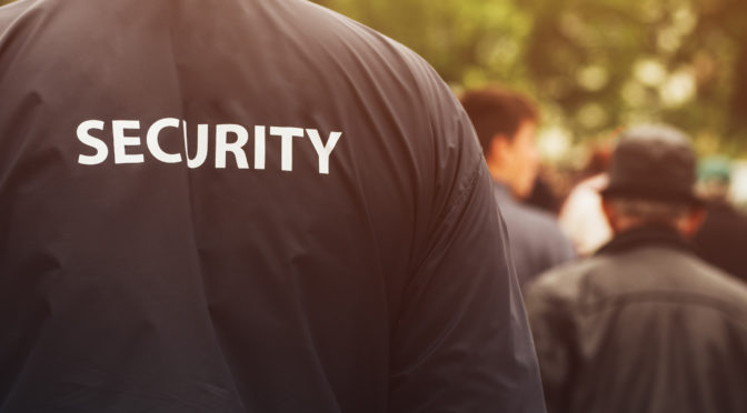 Gate guard security officer on public event
